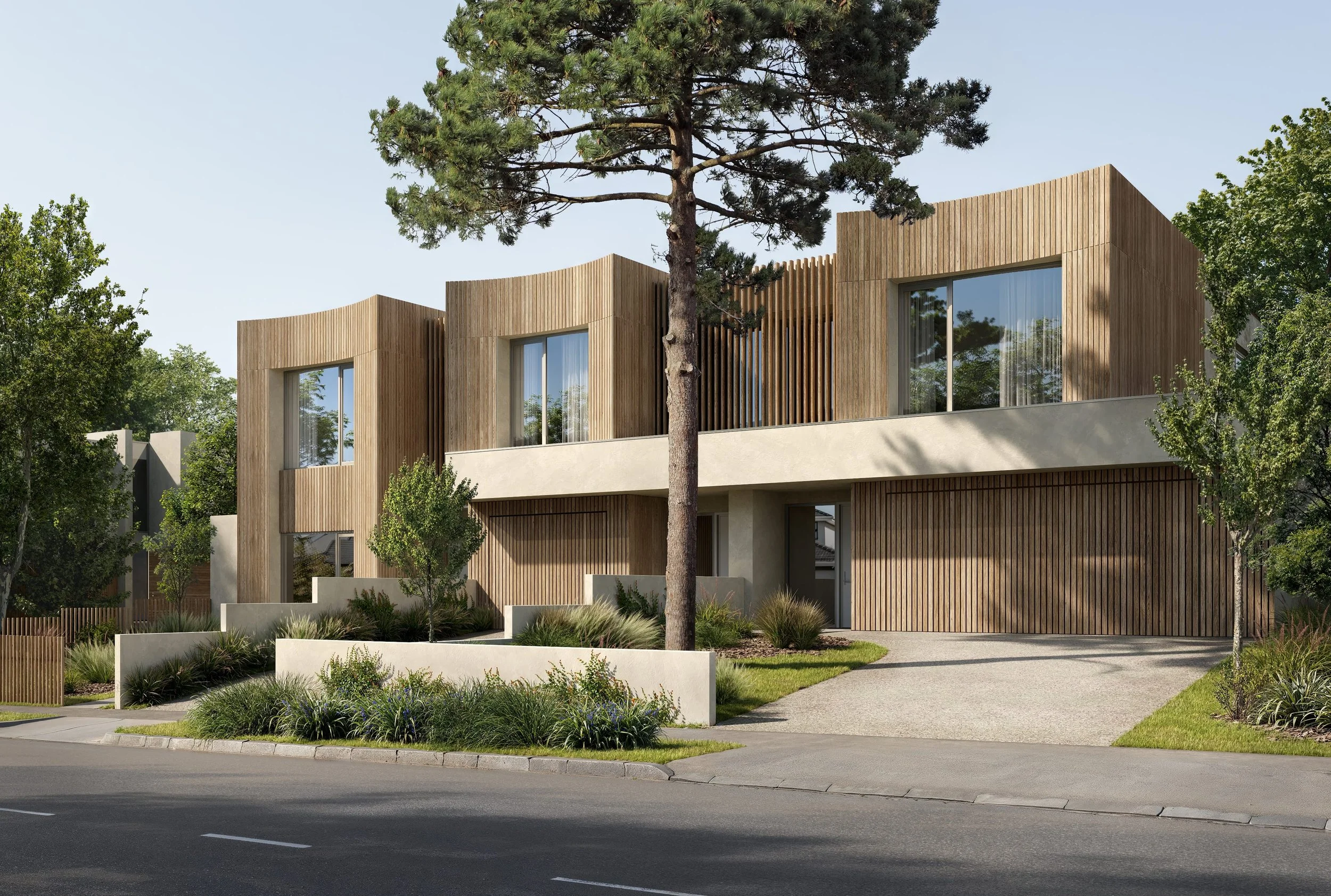 Modern multi-story house with wooden and concrete exterior, large glass windows, surrounded by trees and landscaped yard, on a sunny day.