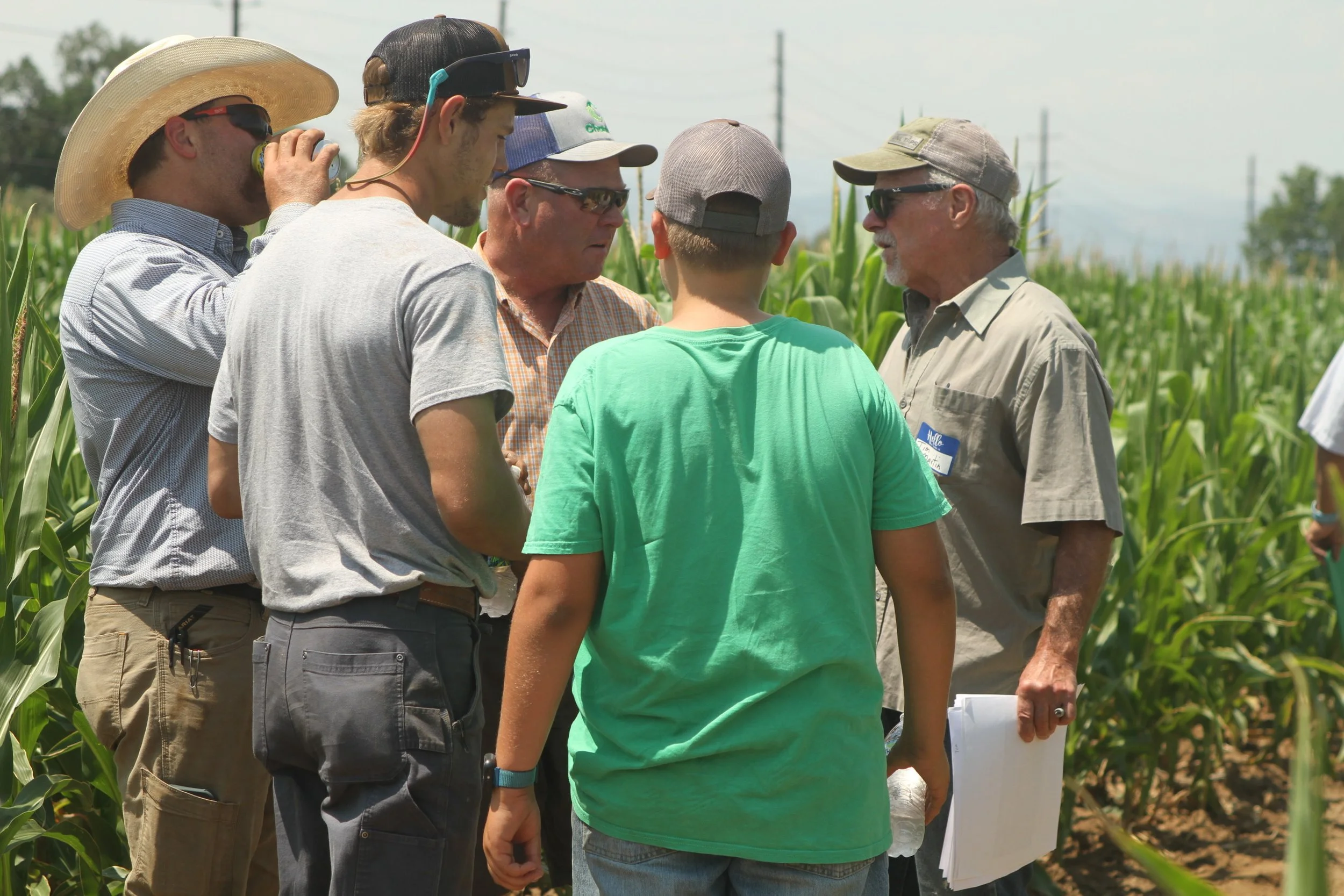  Tim Martin, Irrigation Innovation Consortium executive director, visited with the Brian Kraft family team. 