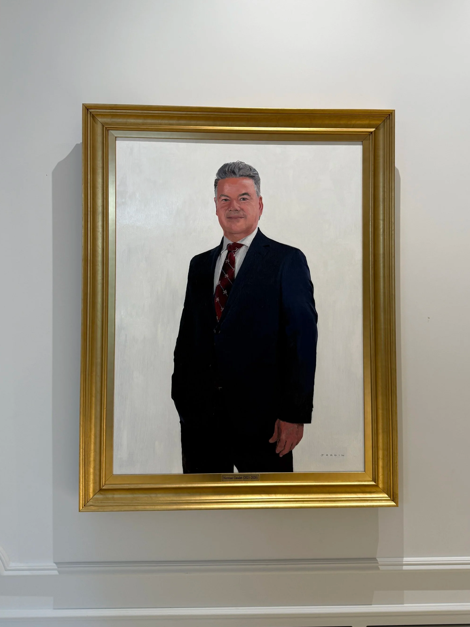 Framed official portrait of a Norman Gaudet, former head of school at TFS, by Canadian portrait painter Jordin Mimran
