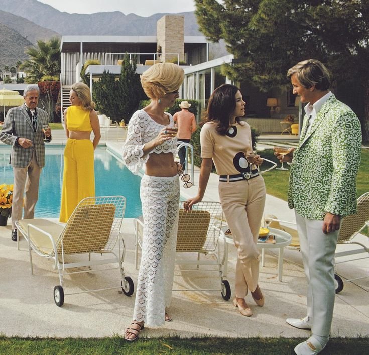 Slim Aarons, "Poolside Party," Palm Springs, 1970. © Slim Aarons / Getty Images.