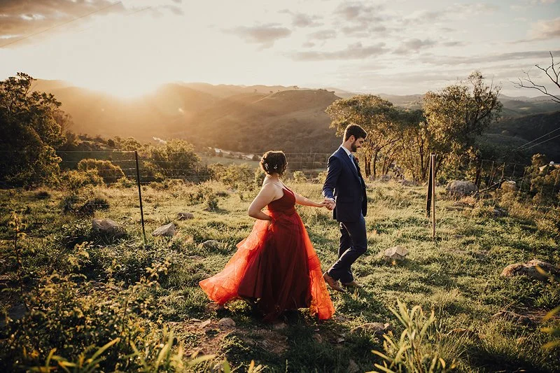 That wedding with the amazing red dress just outside of canberra. The portrait session at sunset was stunning.