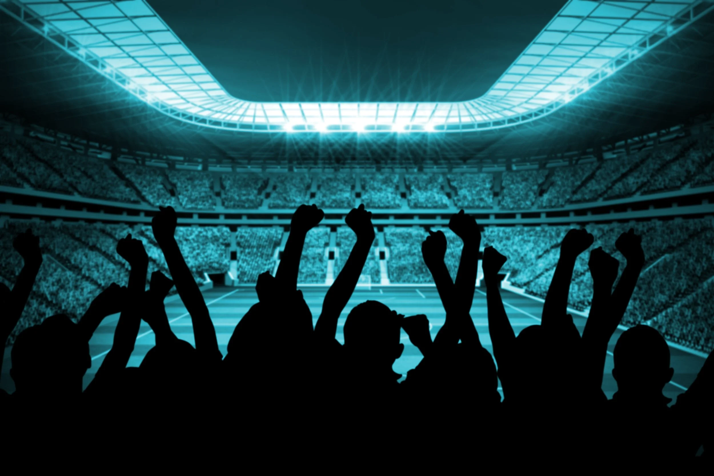 Full football stadium with attendees celebrating