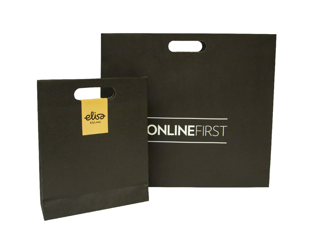 Paperikassi muotoonleikatuilla kahvoilla