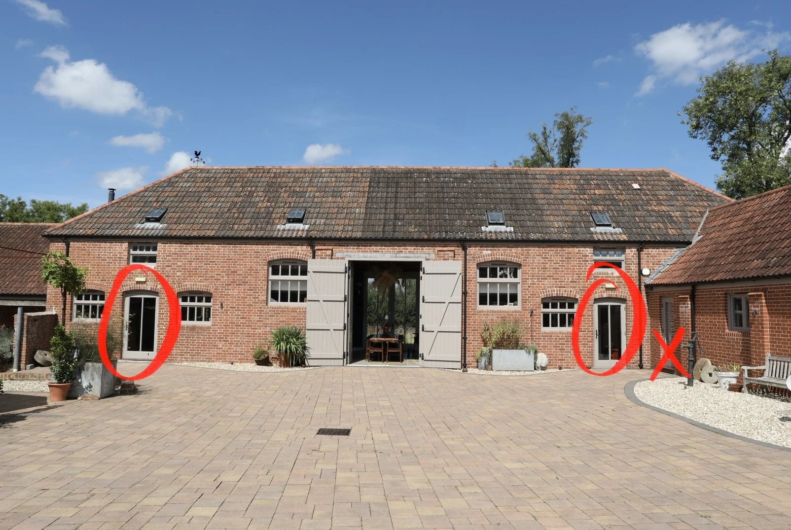 Main doors for The Barn (7 bedrooms). Commercial kitchen marked with "X"