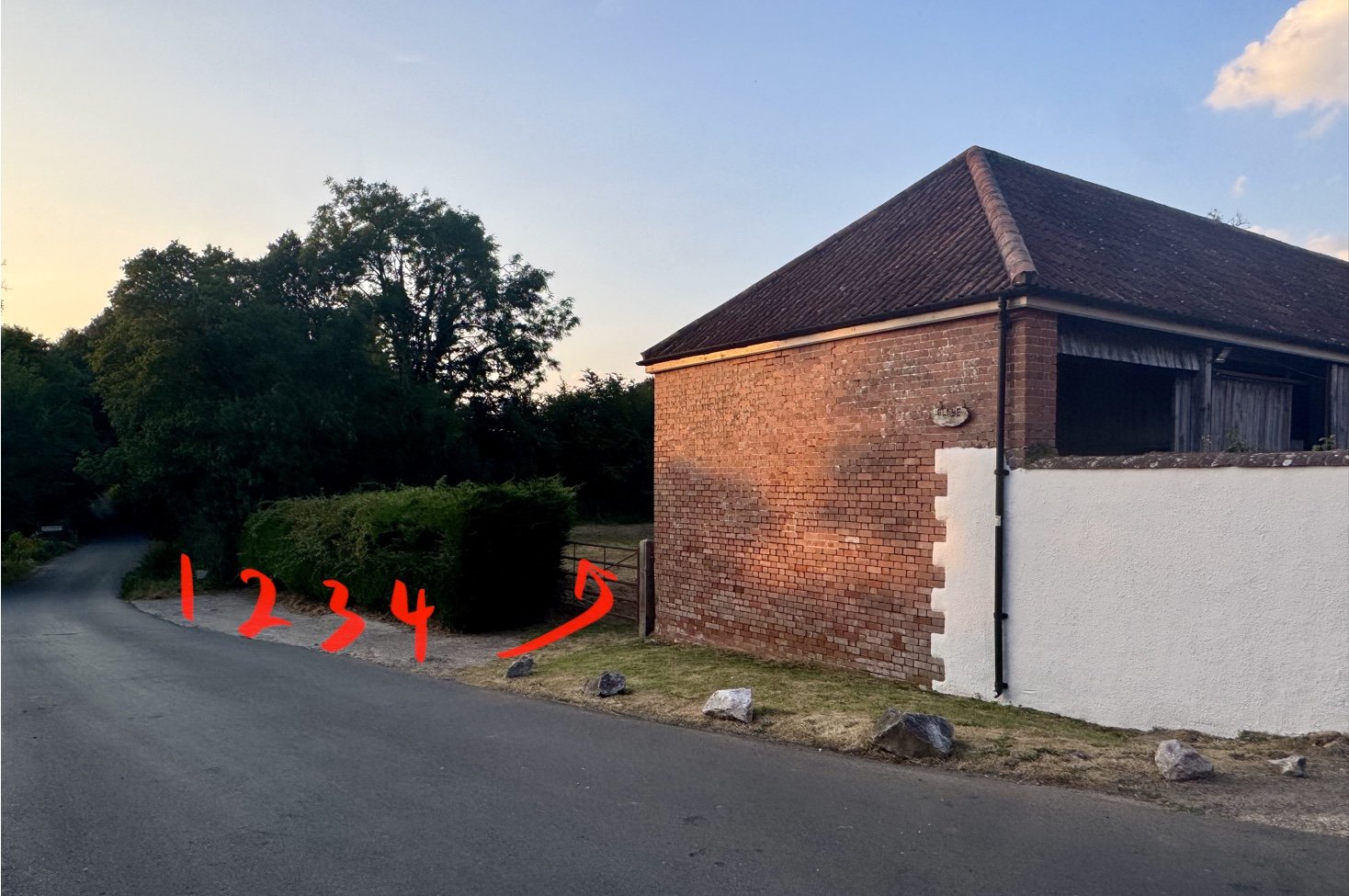 Parking spaces and additional parking behind gate of meadow