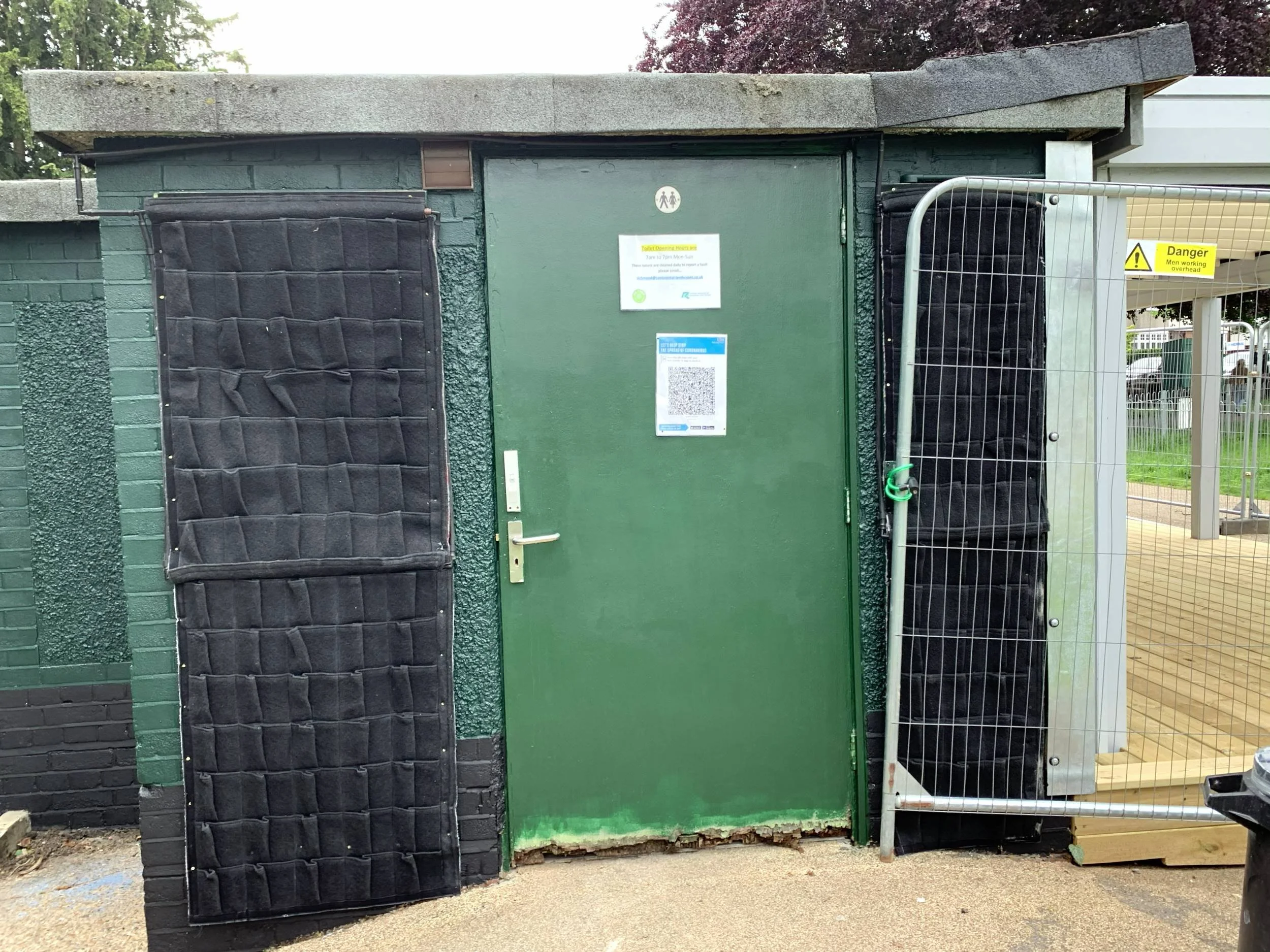 Empty Fytotextile fabric pockets fixed to the wartime gun emplacement at Radnor Gardens Cafe, Twickenham, before planting
