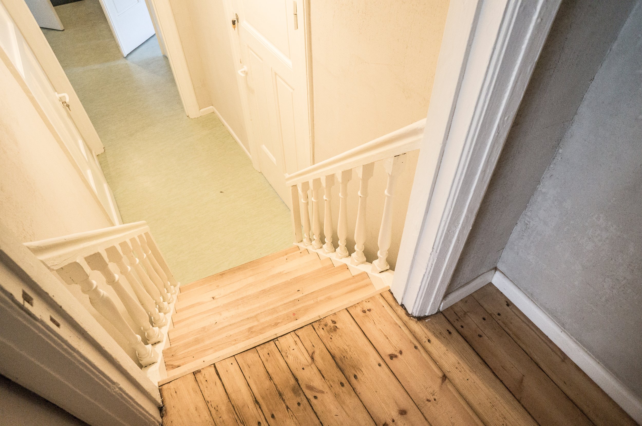 Looking down from stairs to room 4 and 5