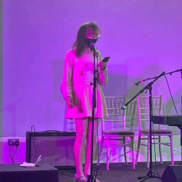 M performing square.JPG