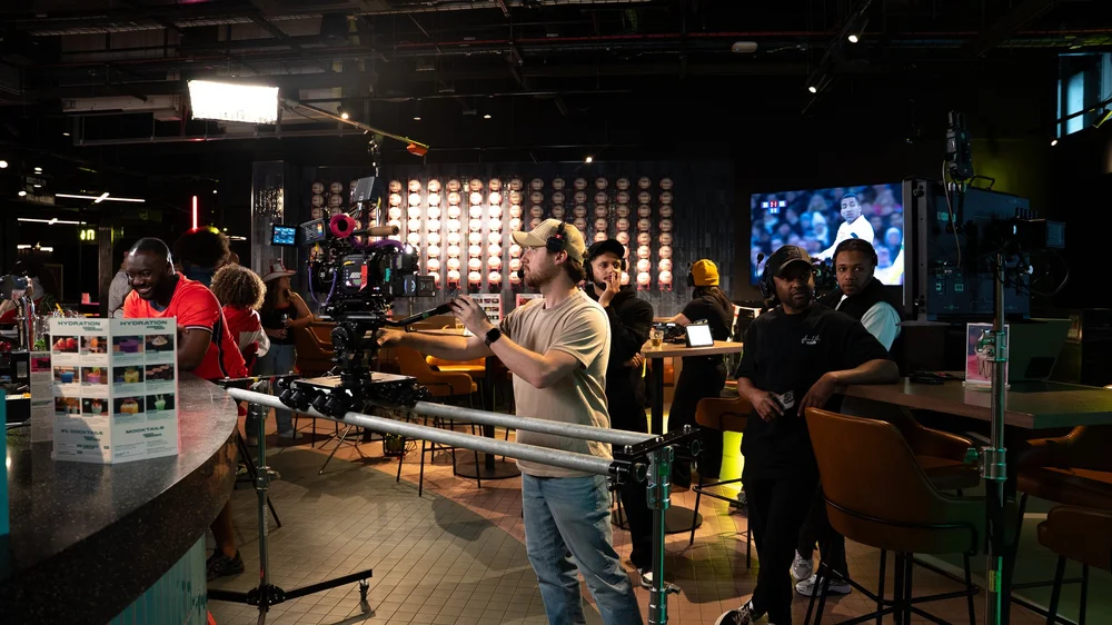 Kubed crew filming in a bar