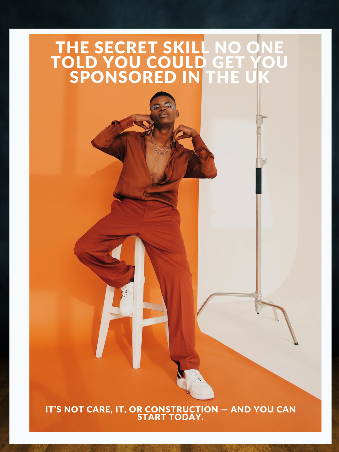 A person sitting on a white stool with an orange background and a white backdrop, wearing a brown outfit with white sneakers. The text on the image says, 'The secret skill no one told you could get you sponsored in the UK. It’s not care, it, or construction — and you can start today.'