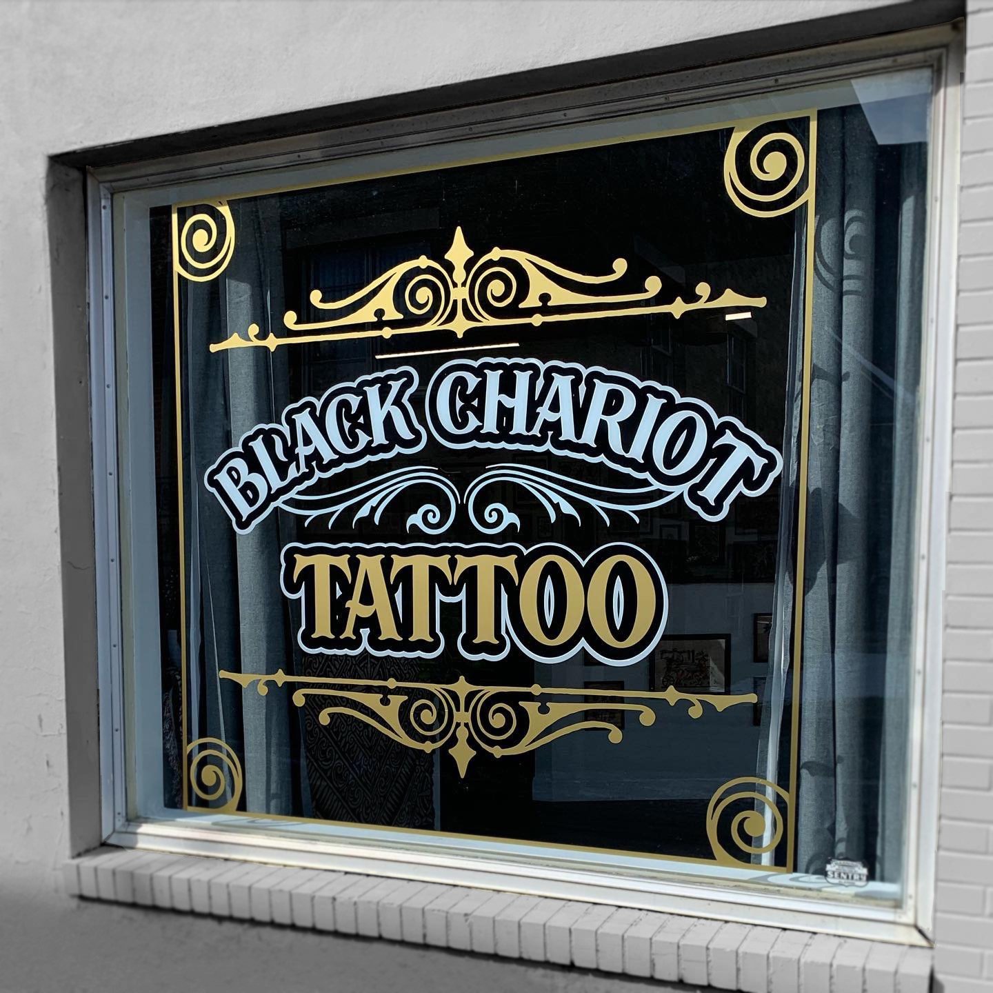 Black Chariot Tattoo Removal