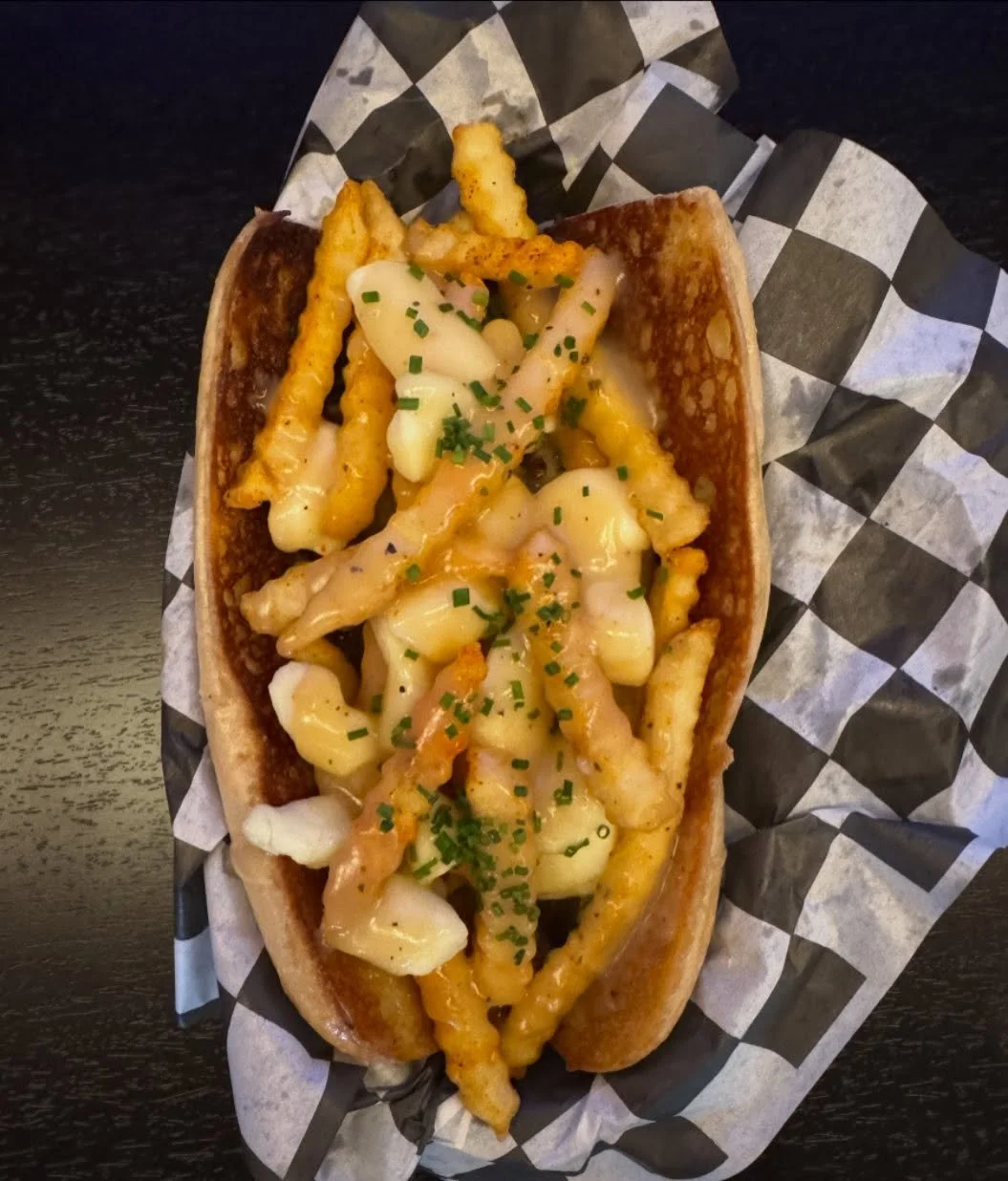 🚨🚨Poutine Chopped Cheese🚨🚨

Two patties, chopped with American, stuffed into a hoagie with cheese curds and fries and smothered with gravy.

Come on dawg