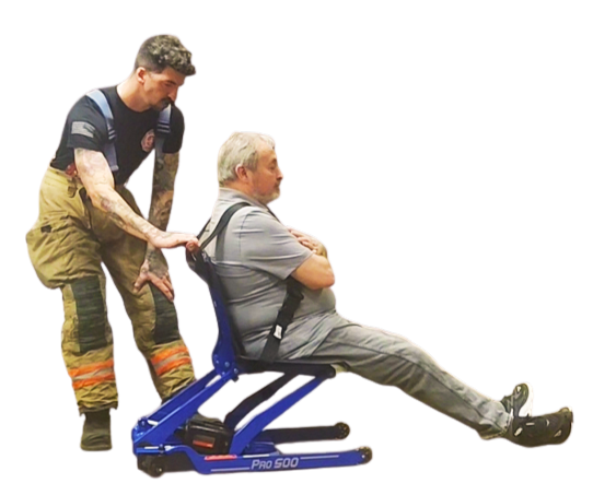 Firefighter using Inva-Lift Pro 500 fall recovery device to lift person from floor safely without manual lifting