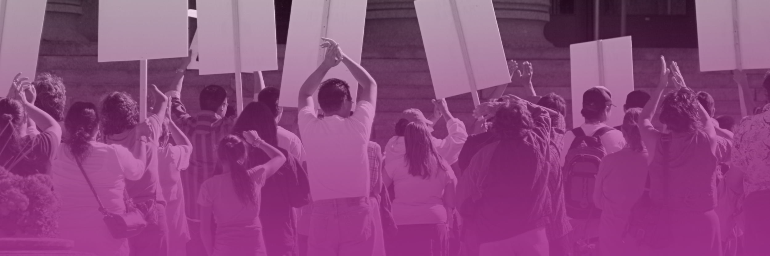 A purple gradient over protesters with signs