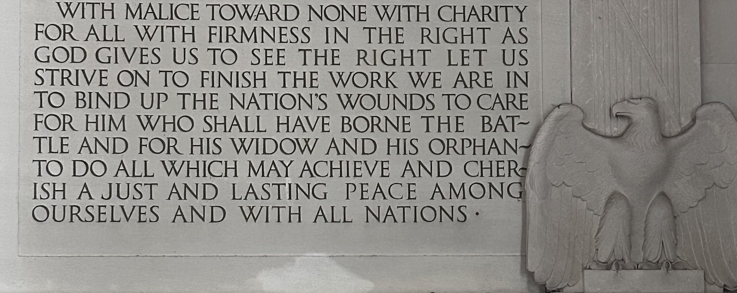 Close up of the Lincoln Memorial wall with the words "With malice toward none with charity for all..." inscribed