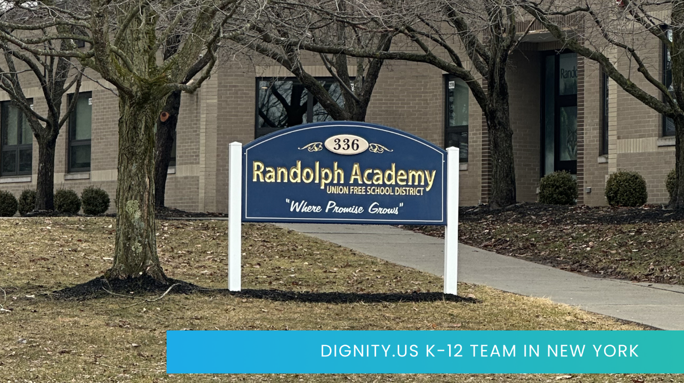 Sign for Randolph Academy, small banner reads Dignity.us K-12 team in New York