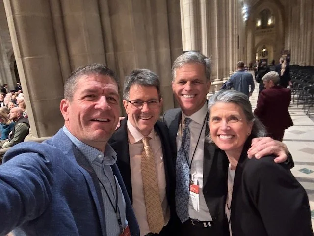 Tim, Tami, and Tom attending an event at the National Cathedral