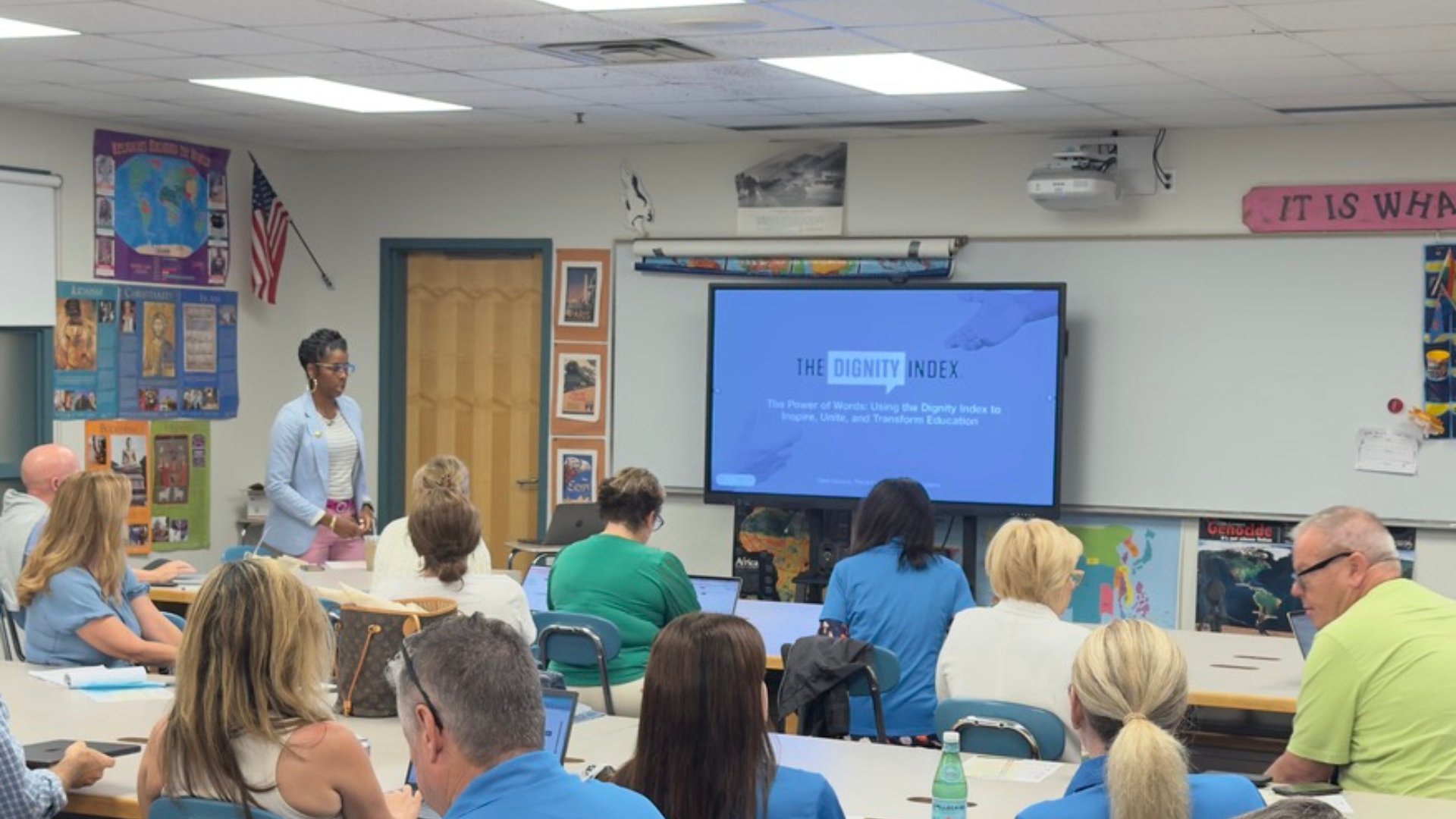 Meghan presenting to a group of adults in an elementary school classroom