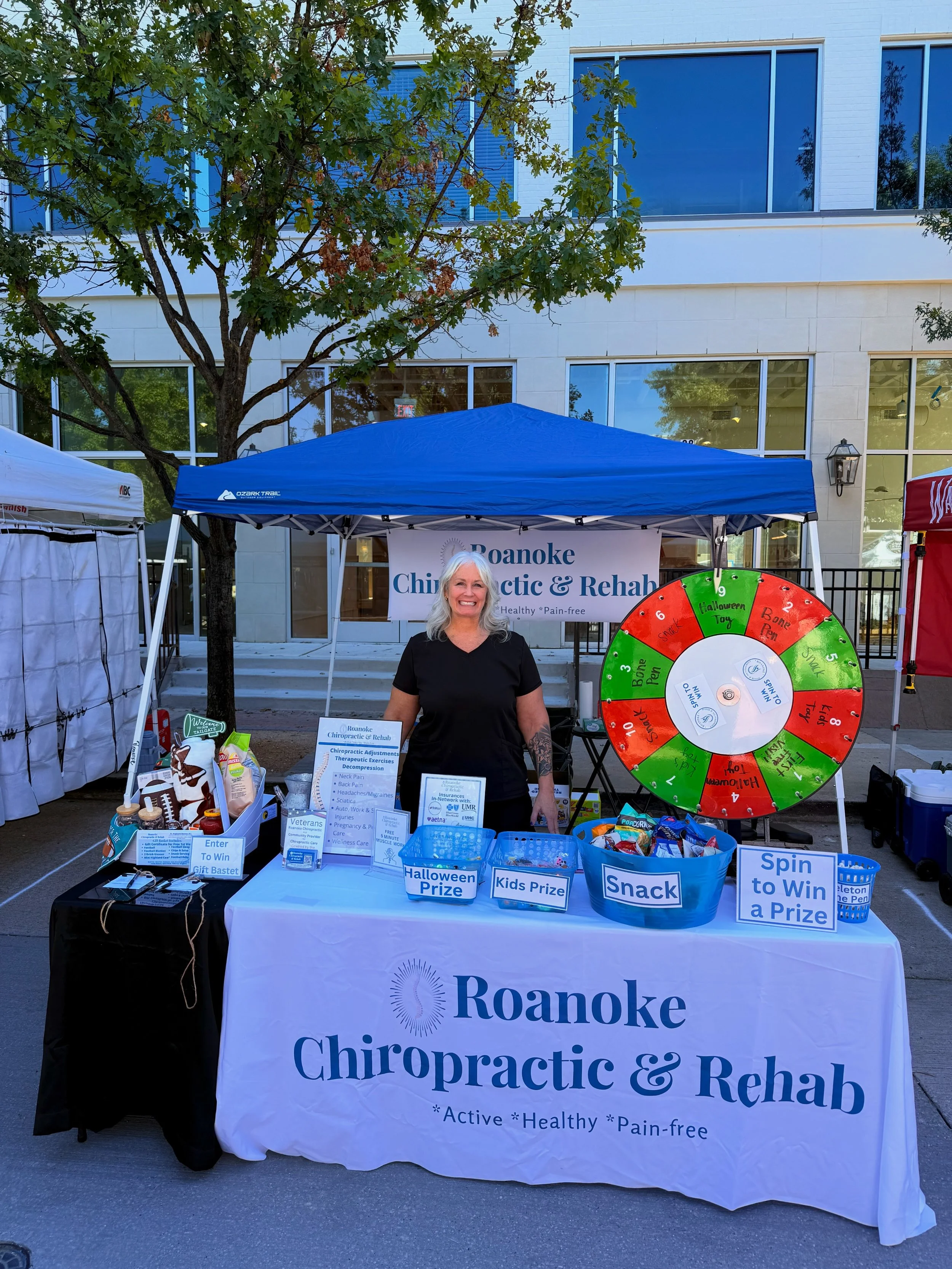 Come visit us at the Celebrate Roanoke today!🤠 Spin the wheel to win a prize, enter our giveaway, and get some muscle work done by Dr. Beavers!