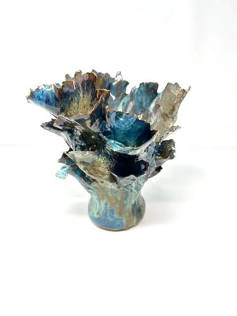 Hand Built, Speckled Buff clay, Four glazes. Fired to Cone 5 in home kiln.  
Dimensions: 9" x 6.5"