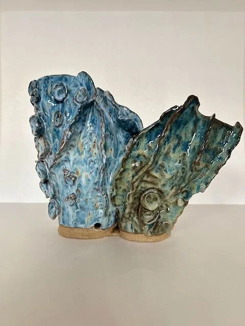 Hand Built, Speckled-Buff clay, Four glazes. 
Fired to Cone 5 in community kiln. 
Dimensions: 11" x 14" 