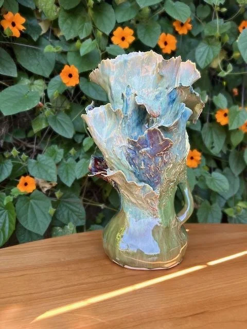 Hand Built, B-Mix clay, Six glazes. 
Fired to Cone 6 in community kiln. 
Dimensions: 11.5" x 6"