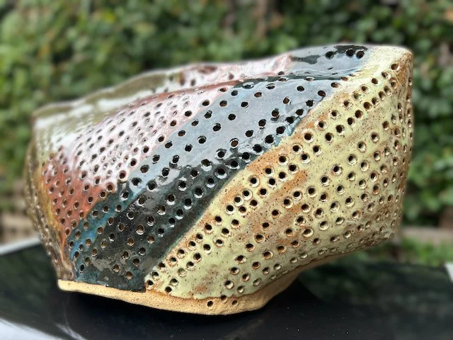 Hand Built, Speckled-Buff clay, Three glazes. 
Fired to Cone 5 in community kiln. 
Dimensions:  18" x 9"