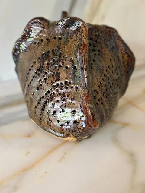 Hand Built, Speckled-Buff clay, Three glazes. 
Fired to Cone 5 in community kiln. 
Dimensions:  8" x 8"