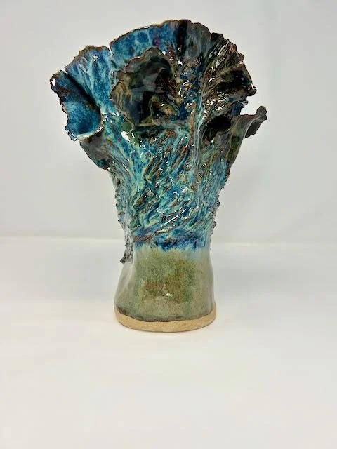 Hand Built, Speckled Buff clay, Five glazes.
Fired to Cone 5 in home kiln. 
Dimensions: 9.5"x 7"