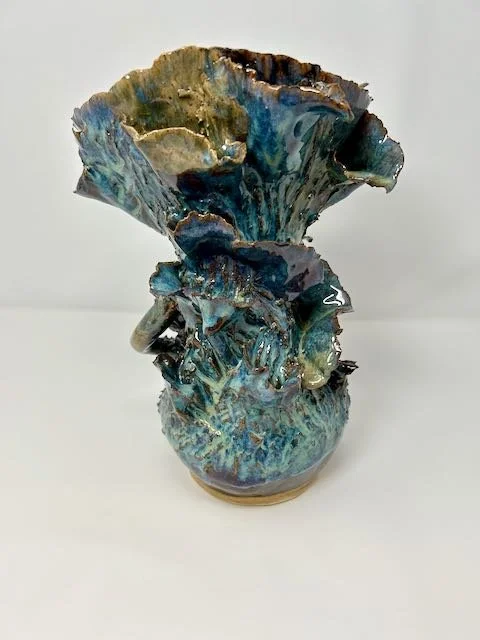 Hand Built, Speckled Buff clay, Six glazes.
Fired to Cone 5 in home kiln. 
Dimensions: 11"x 8"