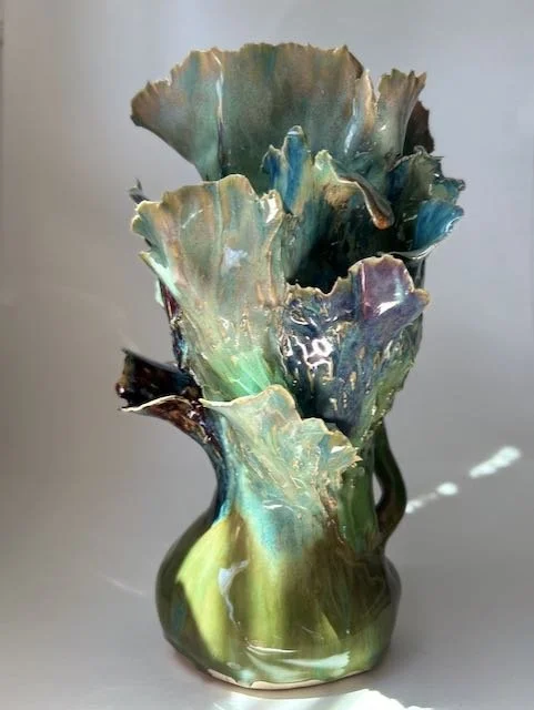 Hand Built, B-Mix clay, Six glazes. 
Fired to Cone 6 in community kiln. 
Dimensions: 11.5" x 6"