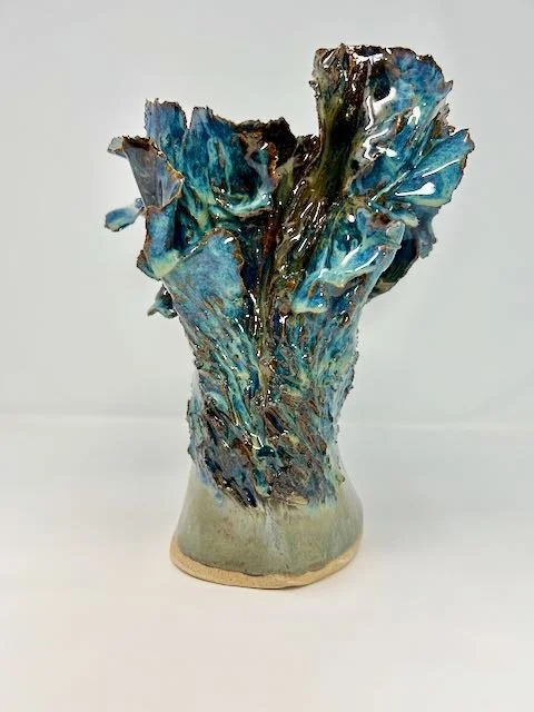 Hand Built, Speckled Buff clay, Five glazes.
Fired to Cone 5 in home kiln. 
Dimensions: 9.5"x 7"