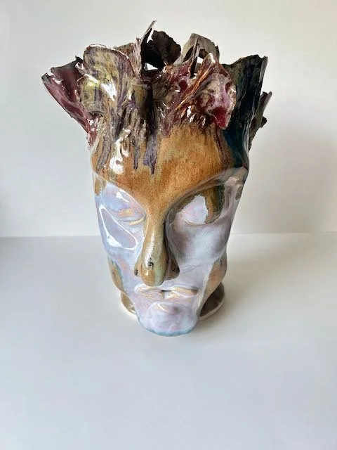 Hand Built, B-Mix clay, Twelve glazes. Fired to Cone 5 in home kiln. 