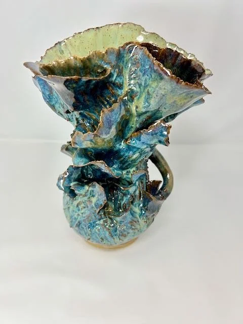 Hand Built, Speckled Buff clay, Six glazes.
Fired to Cone 5 in home kiln. 
Dimensions: 11"x 8"