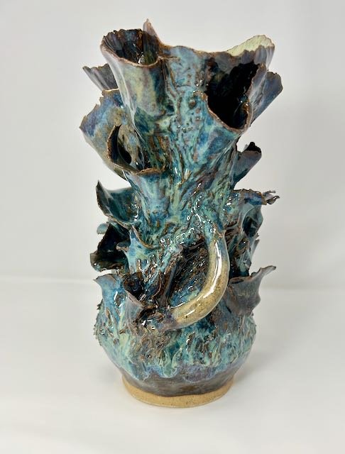 Hand Built, Speckled Buff clay, Six glazes.
Fired to Cone 5 in home kiln. 
Dimensions: 11"x 8"