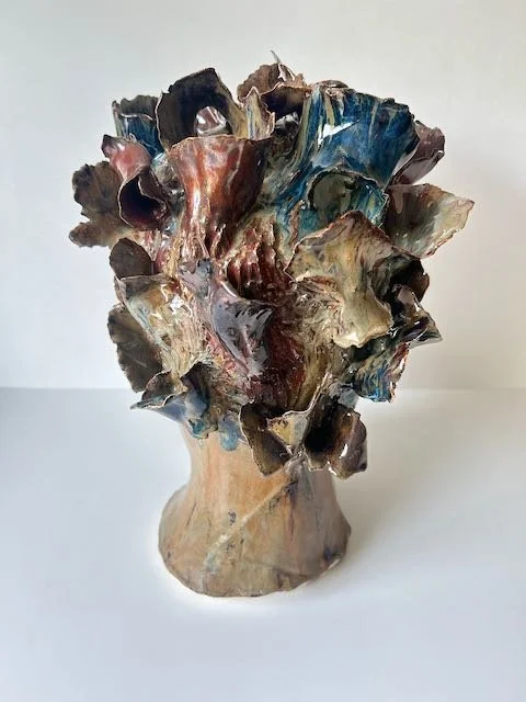 Hand Built, B-Mix clay, Twelve glazes. Fired to Cone 5 in home kiln. 