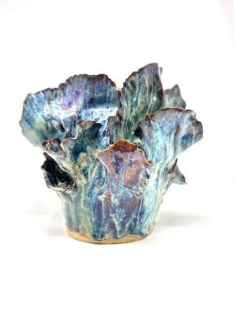 Hand Built, Speckled Buff clay, Seven glazes. Fired to Cone 5 in home kiln. 