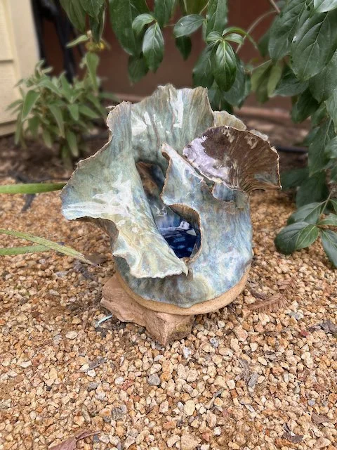 Hand Built, Speckled Buff clay, Five glazes. Fired to Cone 5 in community kiln. 
Dimensions: 11" x 10.5" 