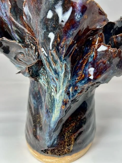 Hand Built, Speckled-Buff clay, Five glazes. 
Fired to Cone 5 in home kiln. 
Dimensions:  9" x 10" 