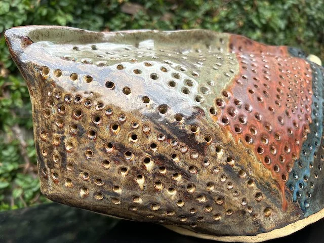 Hand Built, Speckled-Buff clay, Three glazes. 
Fired to Cone 5 in community kiln. 
Dimensions:  18" x 9"