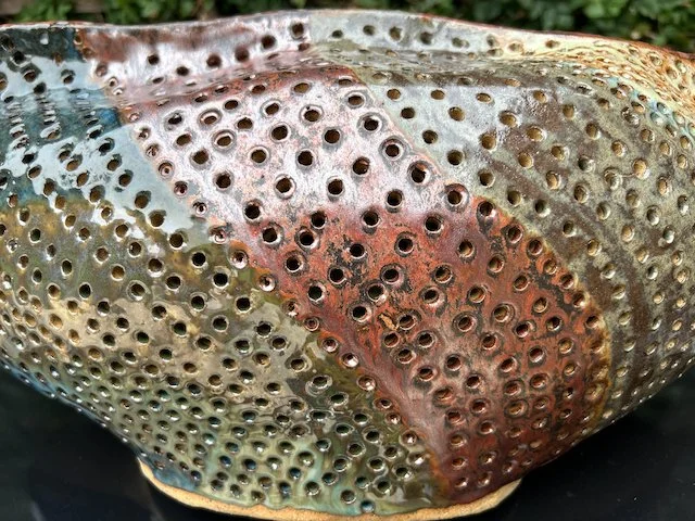 Hand Built, Speckled-Buff clay, Three glazes. 
Fired to Cone 5 in community kiln. 
Dimensions:  18" x 9"