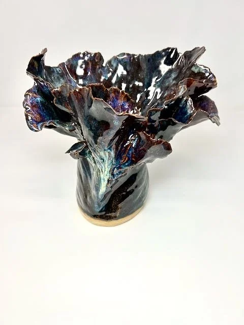 Hand Built, Speckled-Buff clay, Five glazes. 
Fired to Cone 5 in home kiln. 
Dimensions:  9" x 10" 