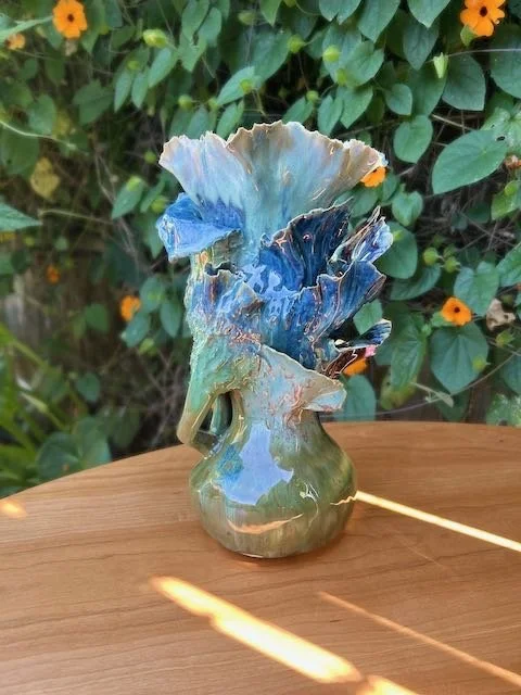 Hand Built, B-Mix clay, Six glazes. 
Fired to Cone 6 in community kiln. 
Dimensions: 11.5" x 6"