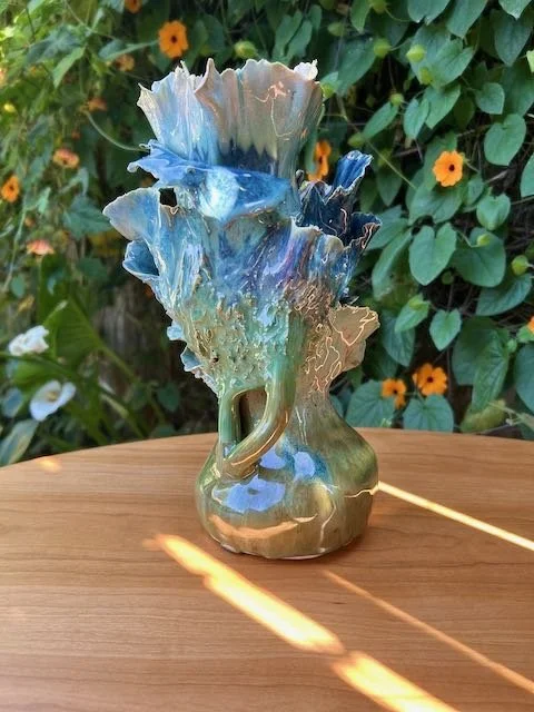 Hand Built, B-Mix clay, Six glazes. 
Fired to Cone 6 in community kiln. 
Dimensions: 11.5" x 6"