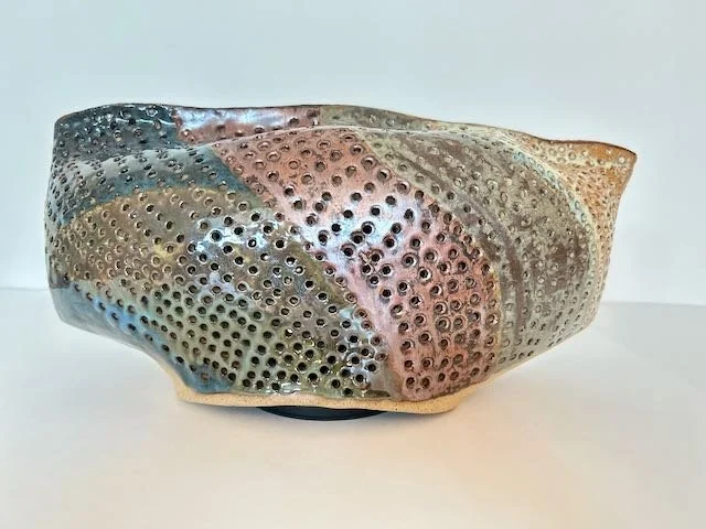 Hand Built, Speckled-Buff clay, Three glazes. 
Fired to Cone 5 in community kiln. 
Dimensions:  18" x 9"