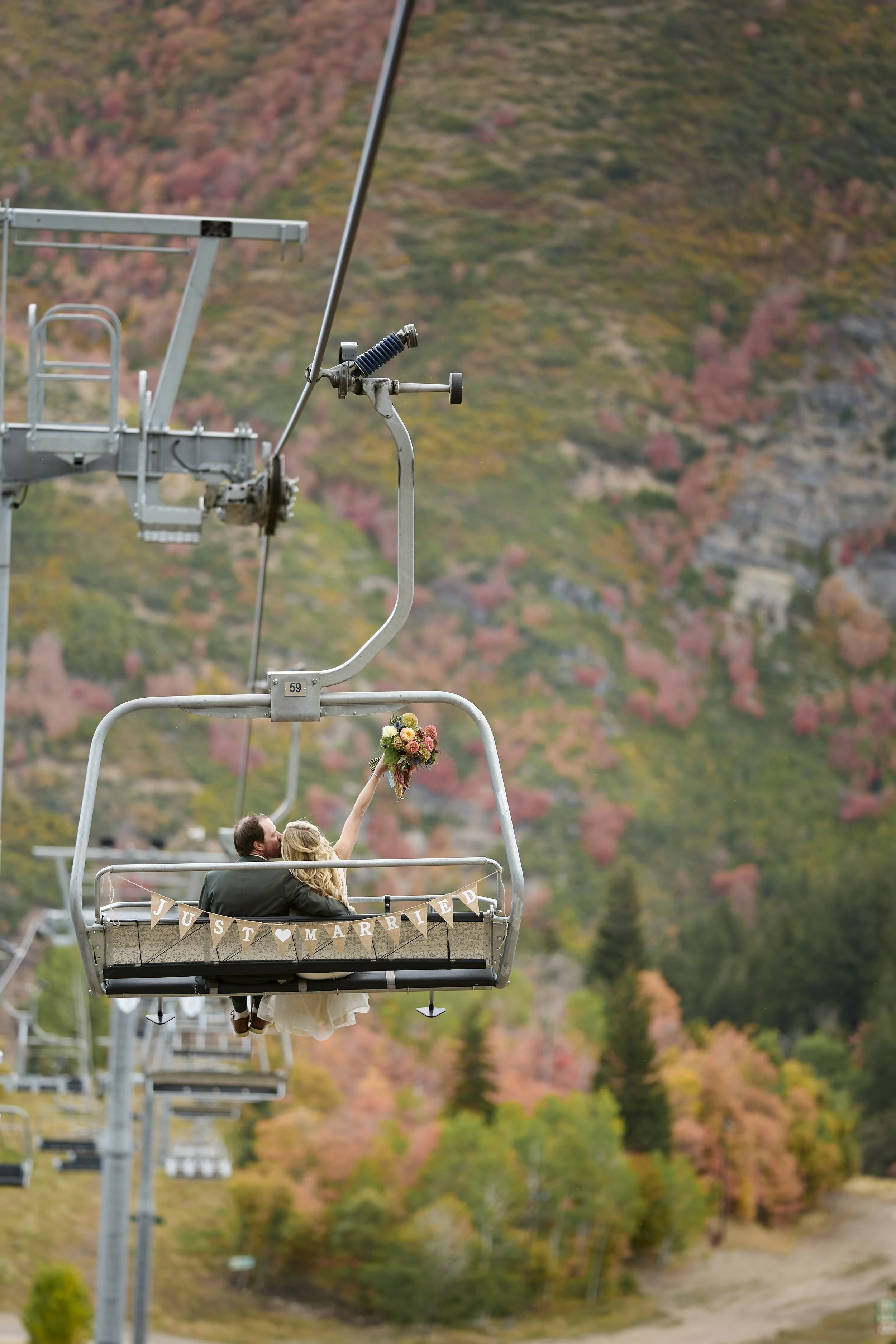 Chair lift to the Mandan Summit at Sundance for a Utah mountain wedding.