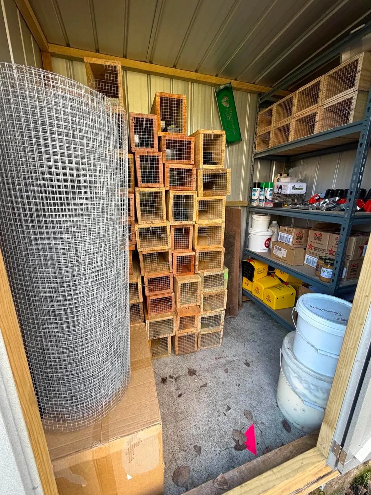 Interior of the new Predator Free Tamahere storage shed showing traps, bait stations and conservation equipment.
