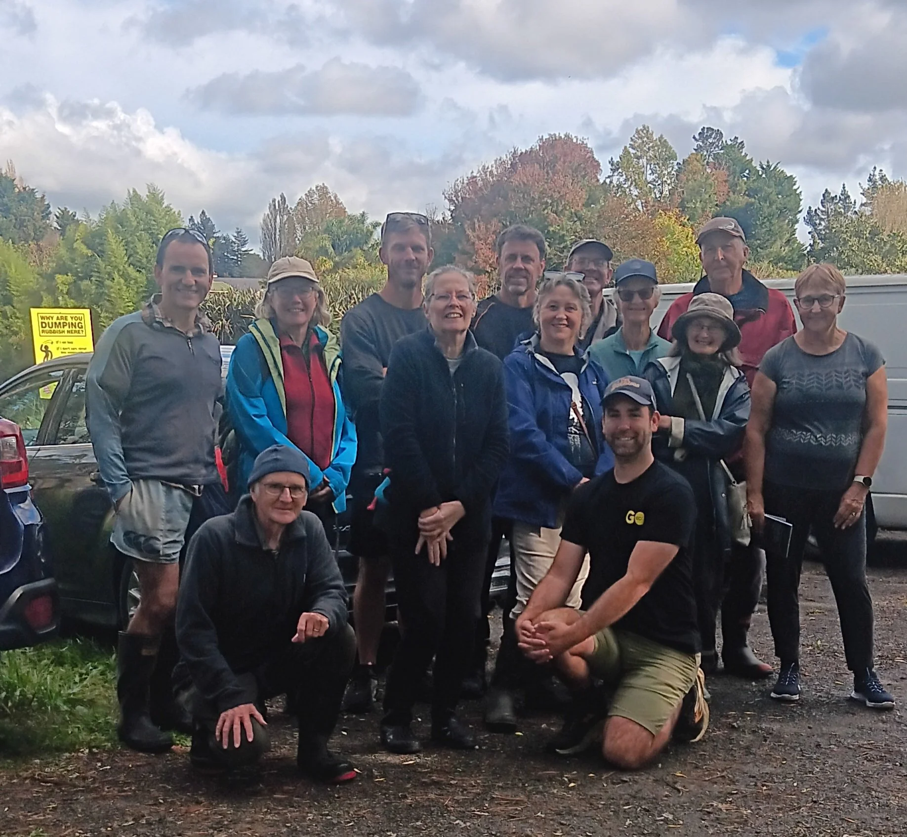 Predator Free Tamahere volunteers and visitors from across the Waikato gather for a group photo after a guided trapline walk in the Tamahere Reserve.