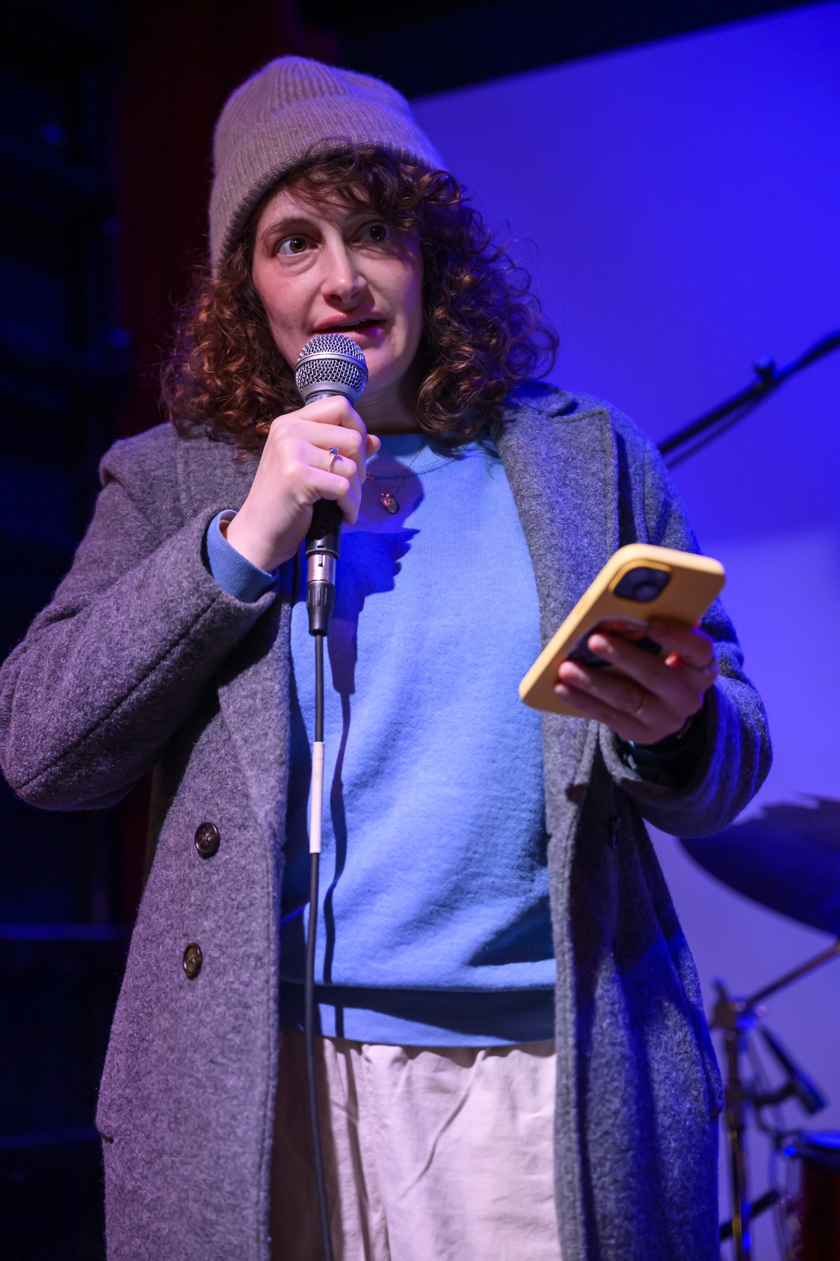 Jo Firestone scrolling through the Cheesecake Factory menu with Max at Union Pool 