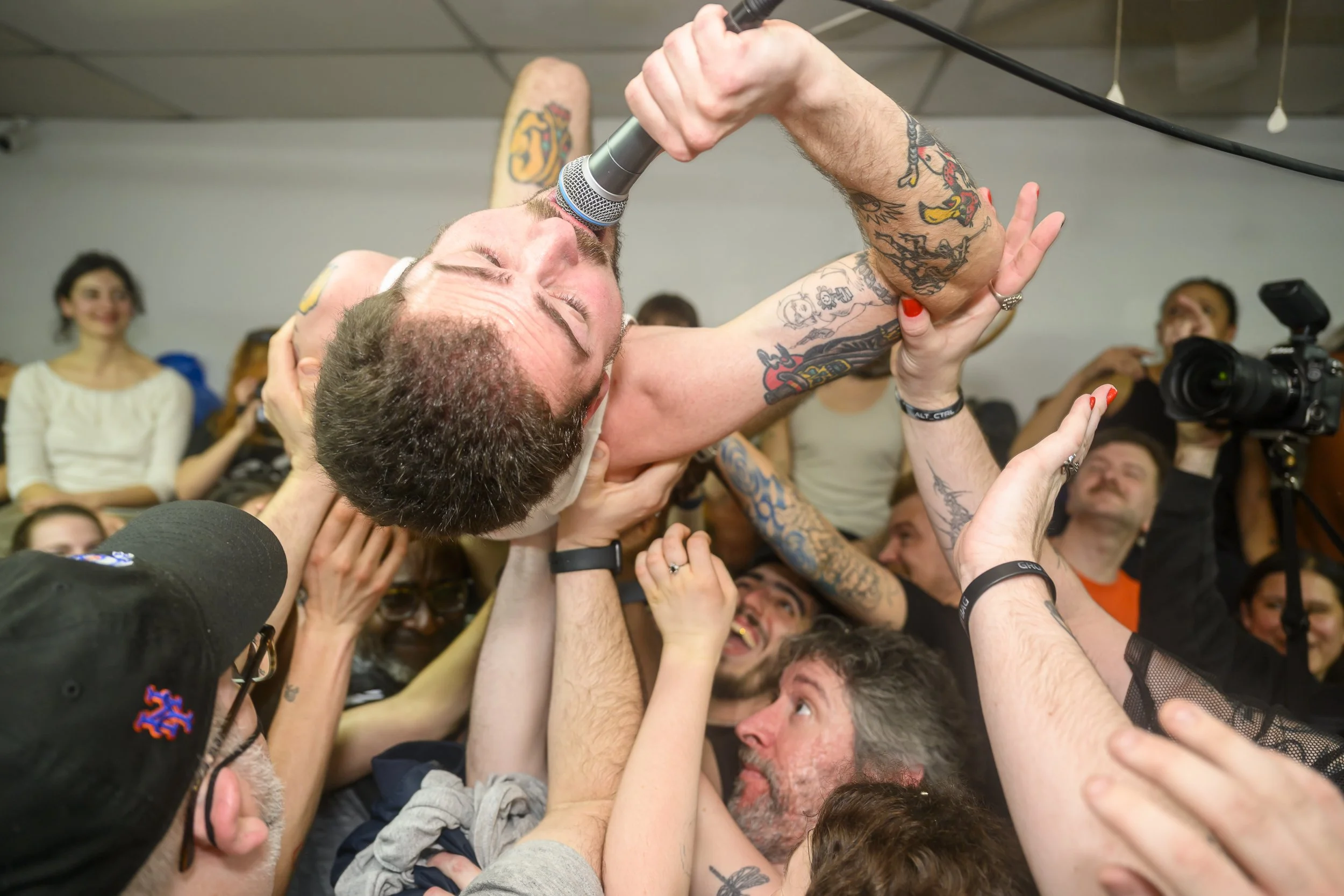 Danny of Lip Critic crowdsurfs during "Milky Max" at Yong Xin Tan Laundromat
